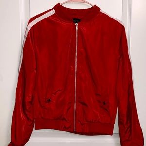 comfy red jacket with lines in the side